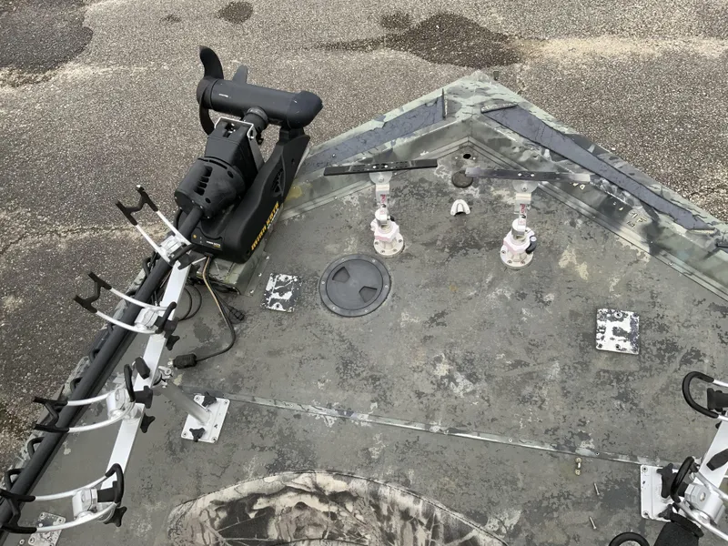 Slide: The Image of 2006 War Eagle 2072CC boat deck with trolling motor and rod holders. - 10