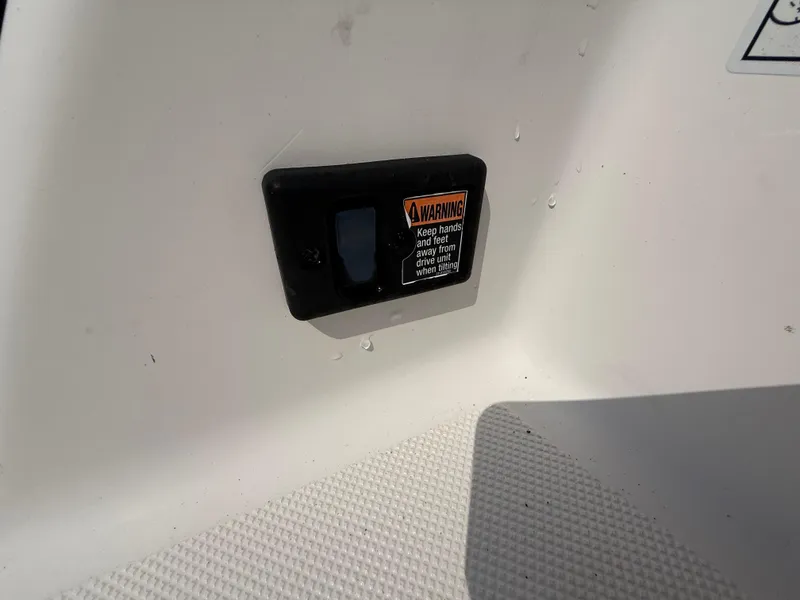 Slide: The Image of Close-up of a warning label on a 2017 Regal 22 FasDeck boat. - 18