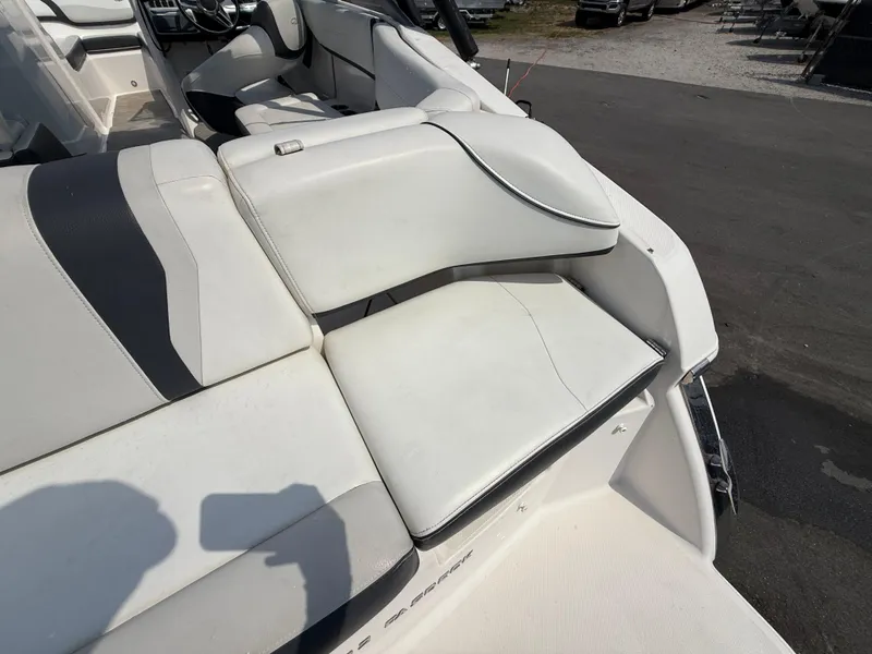Slide: The Image of 2017 Regal 22 FasDeck boat interior with white and gray seating. - 19