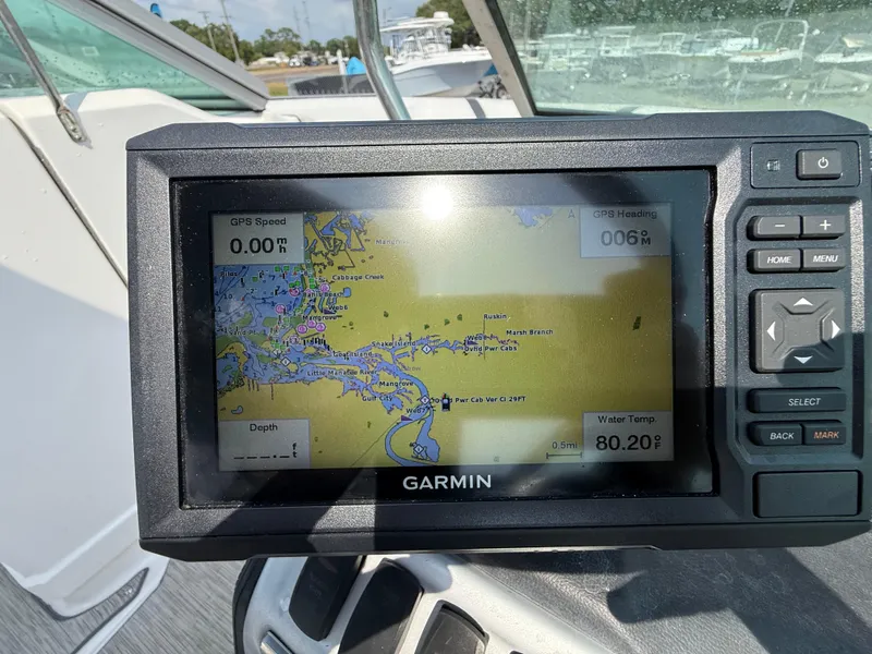 Slide: The Image of Garmin GPS display on 2017 Regal 22 FasDeck boat, showing navigation map and data. - 29