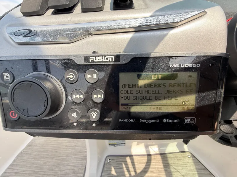 Slide: The Image of Fusion stereo system on a 2017 Regal 22 FasDeck boat dashboard. - 30