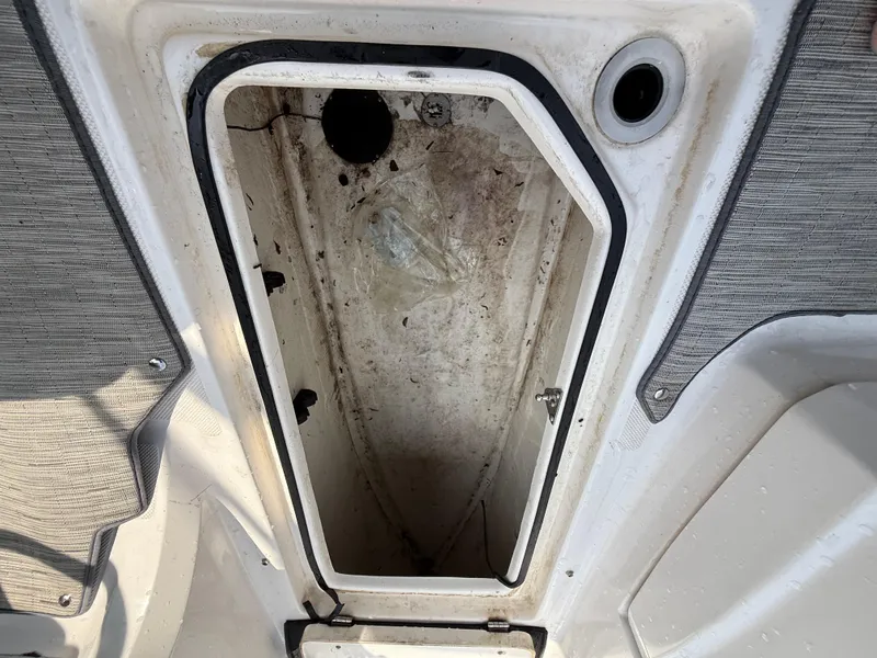 Slide: The Image of Storage compartment of a 2017 Regal 22 FasDeck boat, open and empty. - 40