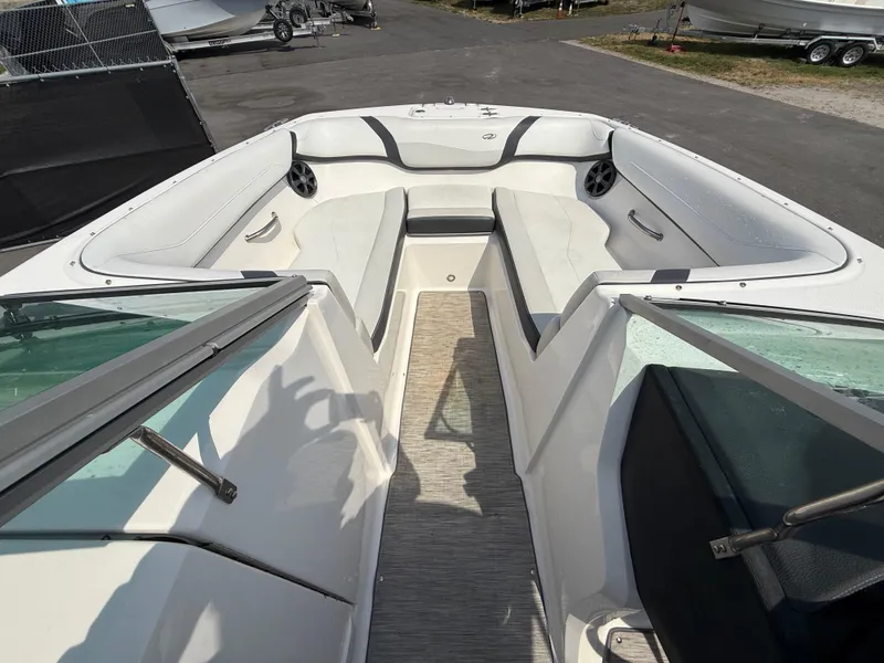 Slide: The Image of 2017 Regal 22 FasDeck boat interior with white seating and open bow design. - 41