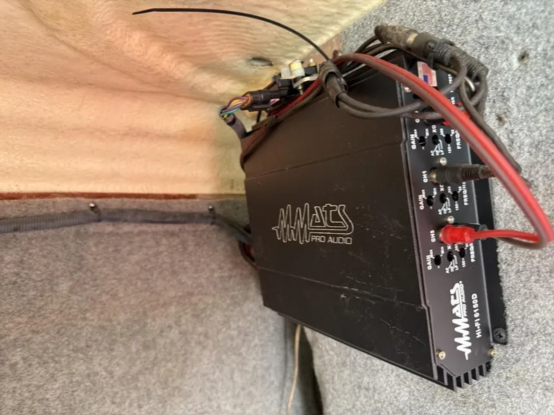 Slide: The Image of Audio amplifier installed in a 2016 Chaparral VRX 203 boat interior. - 3