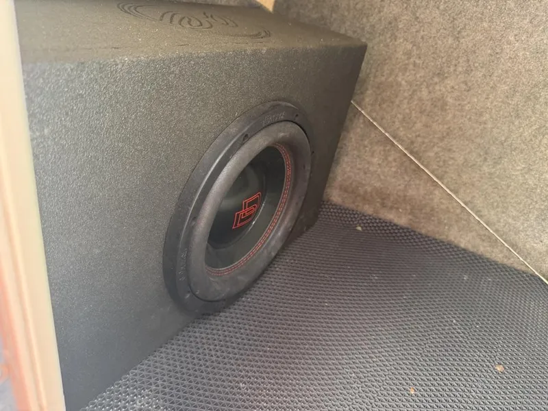 Slide: The Image of Subwoofer installed in a 2016 Chaparral VRX 203 boat interior. - 9