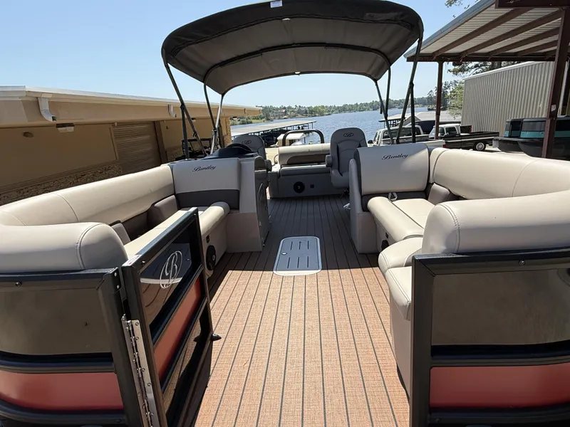 Slide: The Image of 2025 Bentley Pontoons Legacy 243 Swingback 3/4 Tube with spacious seating and canopy. - 10