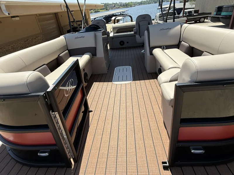 Slide: The Image of 2025 Bentley Pontoons Legacy 243 Swingback interior with spacious seating and elegant design. - 3
