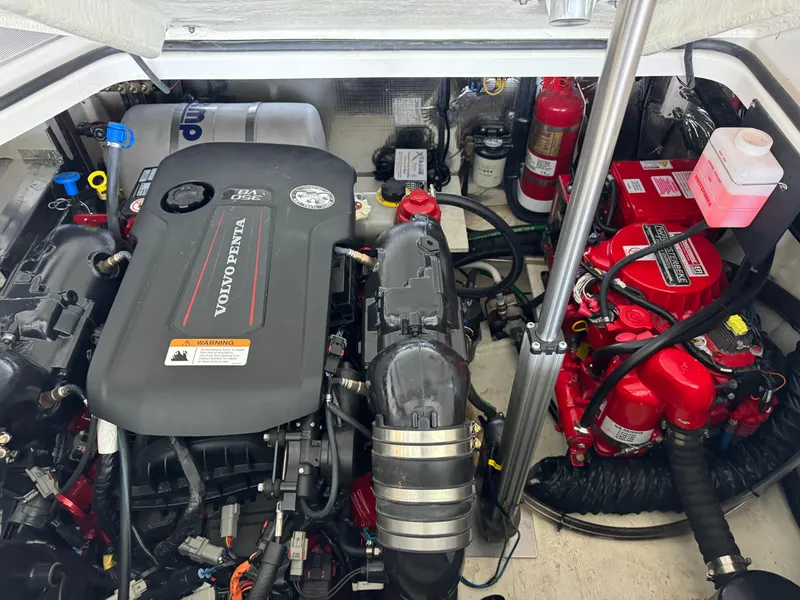 Slide: The Image of Engine compartment of a 2020 Regal 28 Express boat with Volvo Penta engine. - 40
