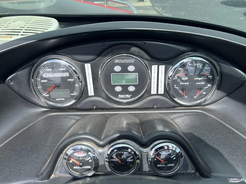Slide: The Image of Dashboard of a 2008 Calabria PRO V boat with speedometer and fuel gauges. - 10