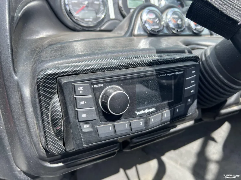 Slide: The Image of Dashboard of a 2008 Calabria PRO V with Rockford Fosgate audio system. - 12