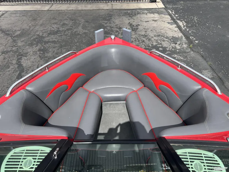 Slide: The Image of 2008 Calabria PRO V boat interior with gray and red seating design. - 5