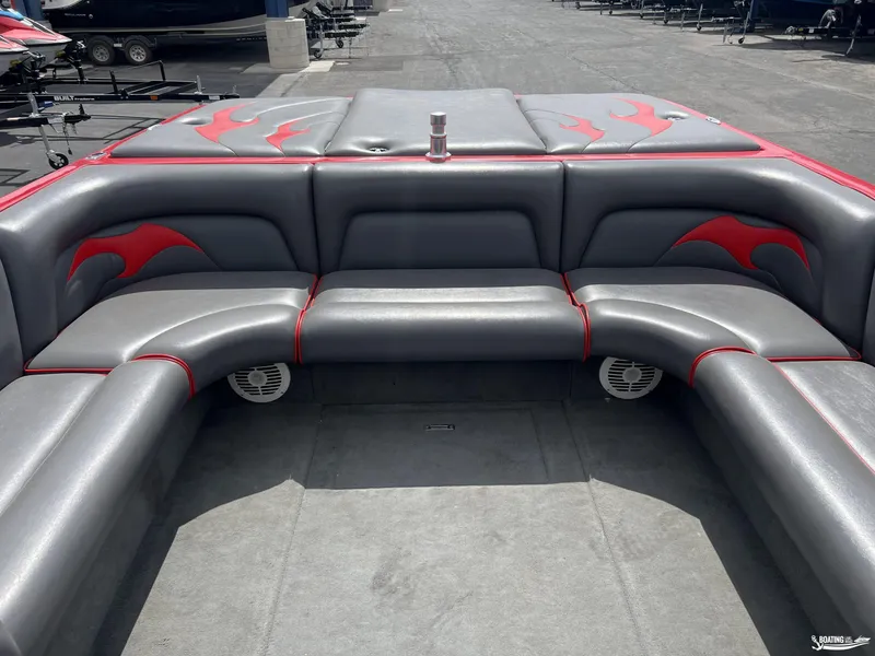 Slide: The Image of 2008 Calabria PRO V boat interior with gray and red seating, flame design accents. - 8