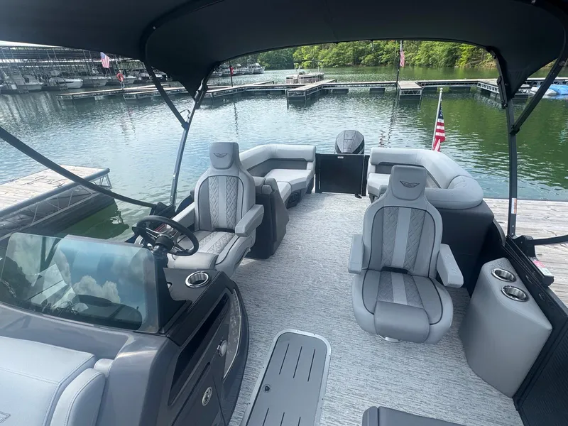 Slide: The Image of 2025 Bennington 22MFB pontoon boat interior with luxurious seating and modern design. - 17