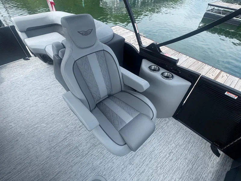 Slide: The Image of Luxurious seating on 2025 Bennington 22MFB boat, featuring elegant design and waterfront view. - 18