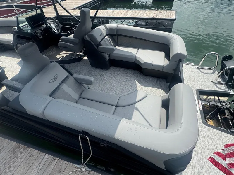 Slide: The Image of 2025 Bennington 22MFB pontoon boat interior with plush seating and modern design. - 30