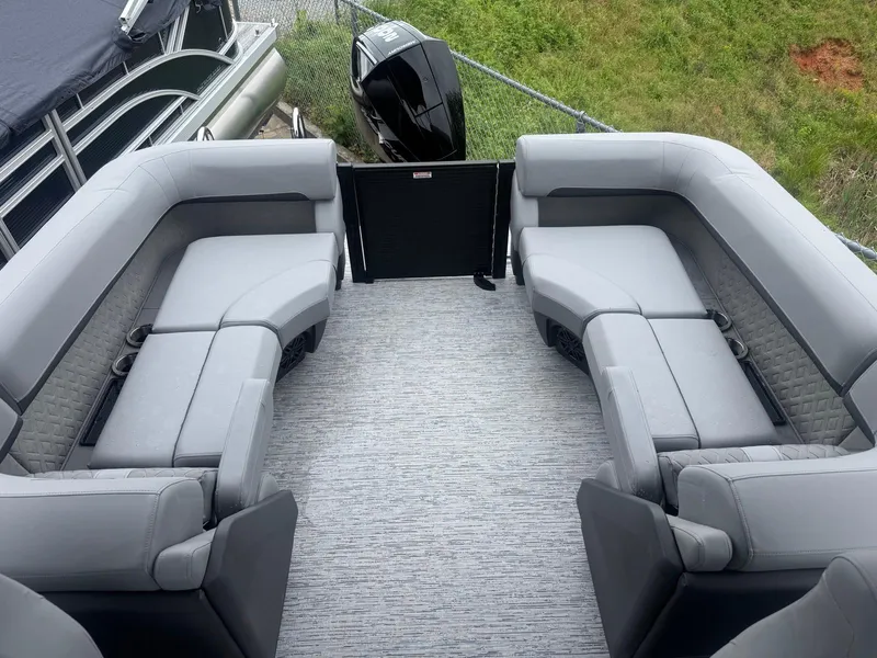 Slide: The Image of Luxurious seating on 2025 Bennington 22MFB pontoon boat, featuring spacious gray upholstery. - 9