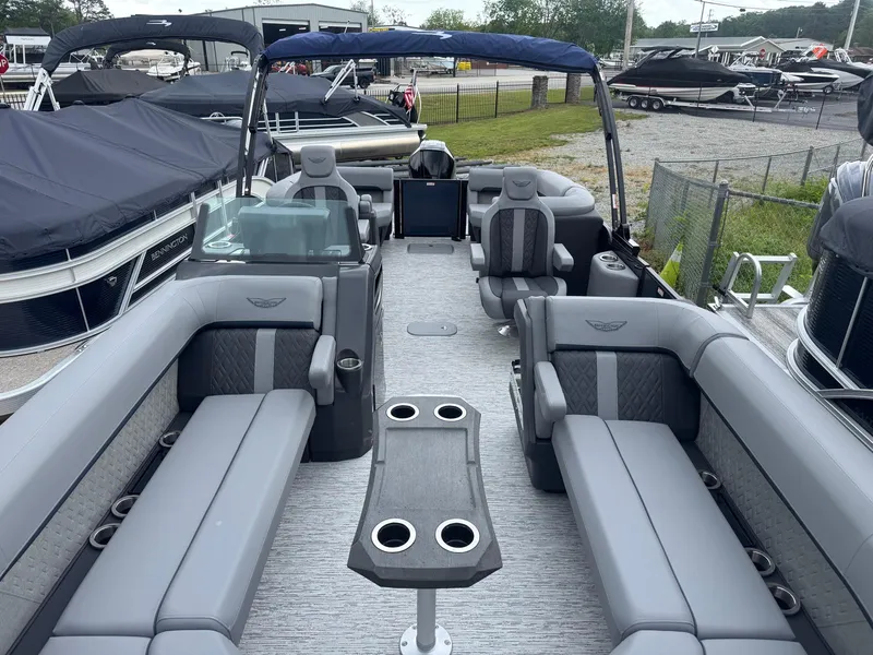 Slide: The Image of 2025 Bennington 24MFB pontoon boat with luxurious seating and modern design. - 11