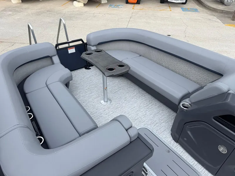 Slide: The Image of Luxurious seating area on 2025 Bennington 24MFB pontoon boat with sleek gray upholstery. - 4