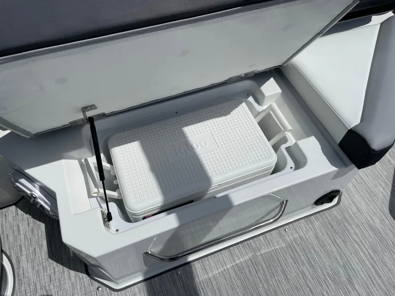 Slide: The Image of Storage compartment with Igloo cooler in 2022 Cobalt R8 boat. - 10