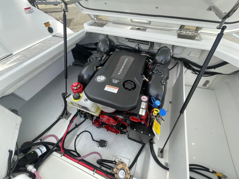 Slide: The Image of Engine compartment of a 2022 Cobalt R8 boat featuring a Volvo Penta 430 V8 engine. - 14