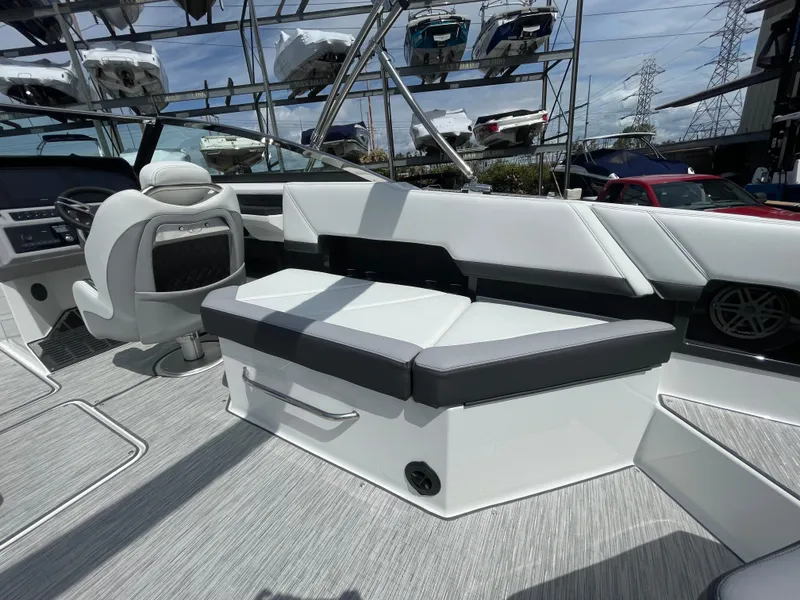 Slide: The Image of 2022 Cobalt R8 boat interior with sleek seating and modern dashboard design. - 9