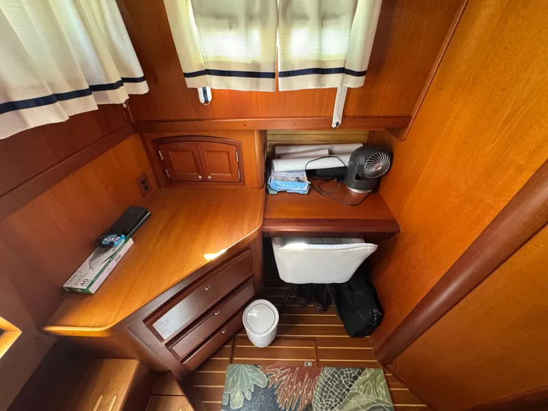 Slide: The Image of 28 2005 Sabreline 47 Owner's Stateroom Vanity Desk Port Aft - 25