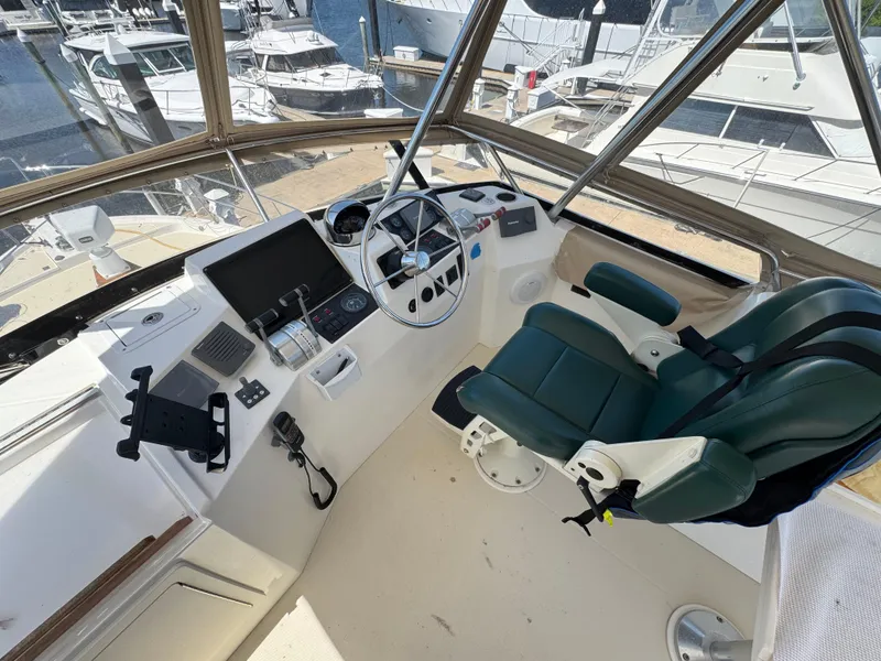 Slide: The Image of 11 2005 Sabreline 47 Flybridge Helm 1 - 8
