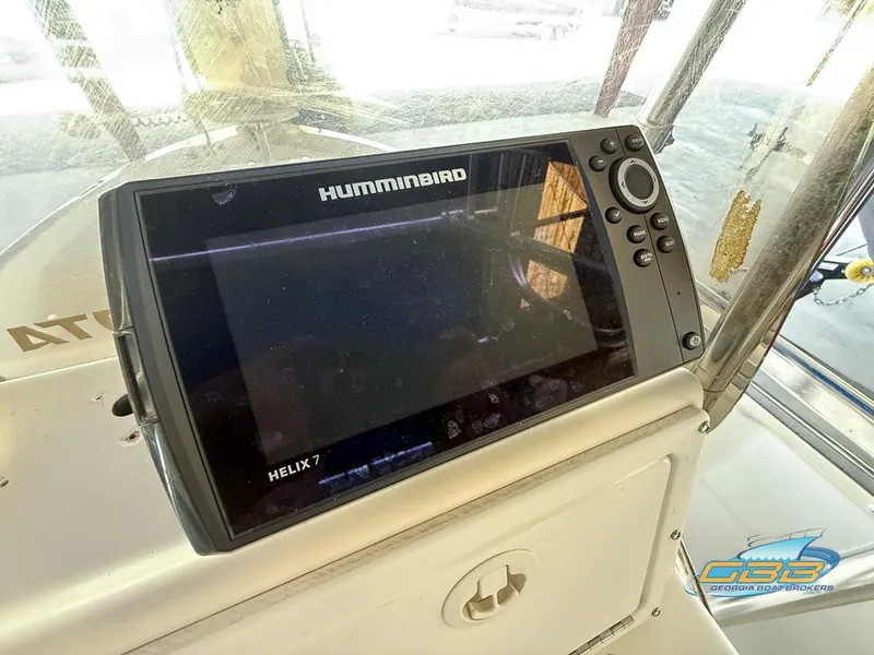 Slide: The Image of Humminbird Helix 7 fish finder on 2004 NauticStar 1900 Nautic Bay boat console. - 15