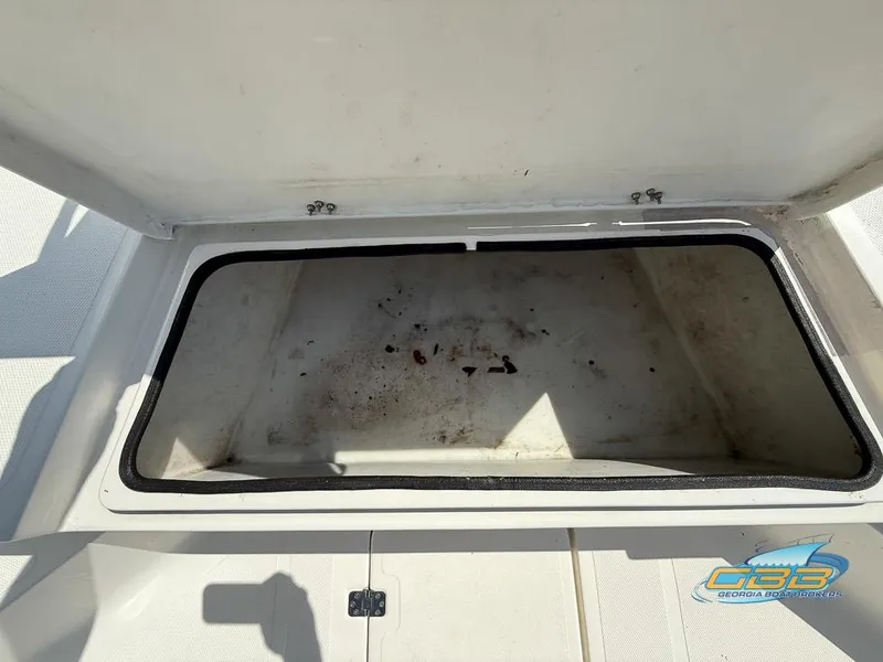Slide: The Image of Open storage compartment on 2004 NauticStar 1900 Nautic Bay boat. - 17