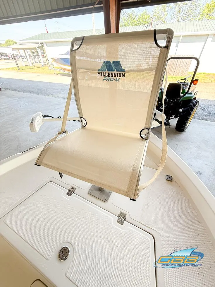 Slide: The Image of Millennium boat seat on 2004 NauticStar 1900 Nautic Bay, in a covered area. - 21