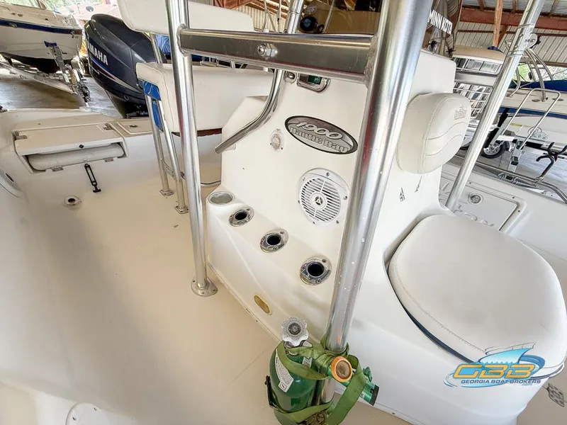 Slide: The Image of 2004 NauticStar 1900 Nautic Bay boat interior with seating and storage features. - 24