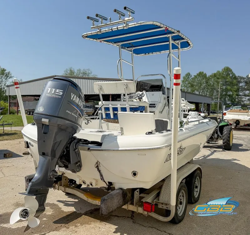 Slide: The Image of 2004 NauticStar 1900 Nautic Bay boat with Yamaha 115 outboard motor on trailer. - 3