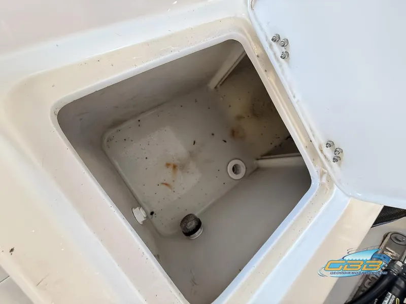 Slide: The Image of Open storage compartment on 2004 NauticStar 1900 Nautic Bay boat. - 32