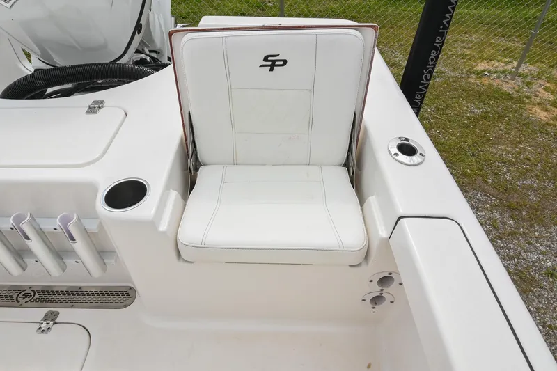 Slide: The Image of 2021 Sea Pro 208 Bay boat seat with cup holder and storage compartments. - 15