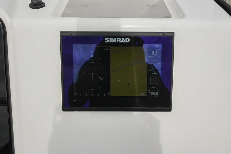 Slide: The Image of Simrad navigation display on 2021 Sea Pro 208 Bay boat dashboard. - 26
