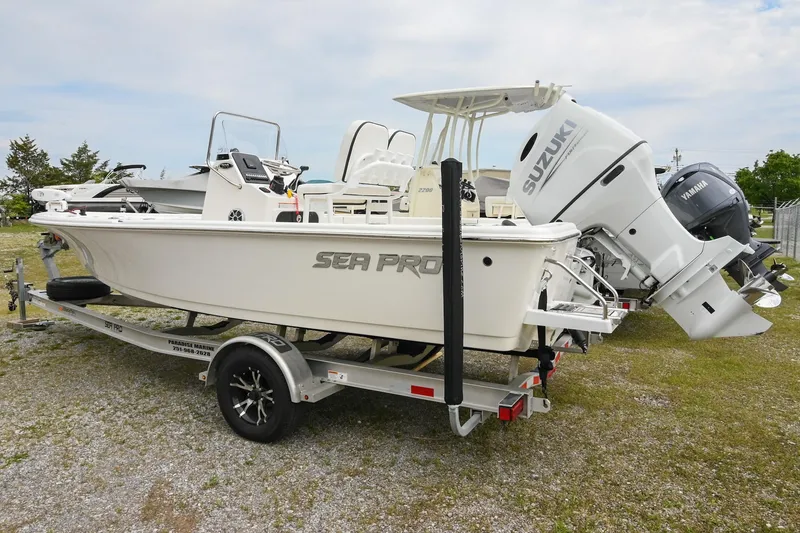 Slide: The Image of 2021 Sea Pro 208 Bay boat on trailer with Suzuki outboard motor. - 3