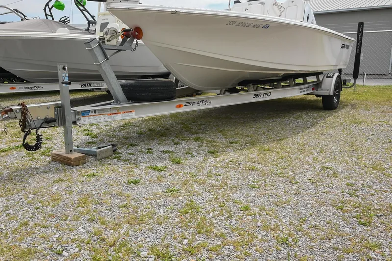 Slide: The Image of 2021 Sea Pro 208 Bay boat on trailer, parked on gravel lot. - 39