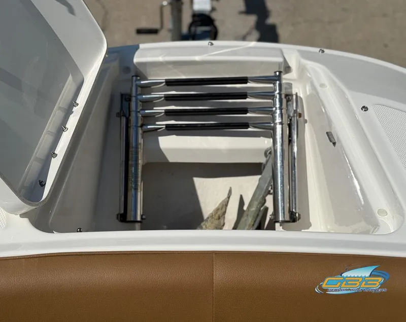 Slide: The Image of 2015 Sea Ray 240 Sundeck boat ladder and storage compartment. - 33