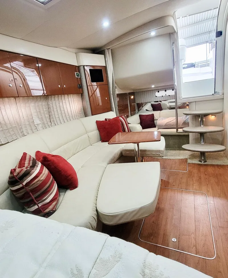Slide: The Image of Luxurious interior of a 2007 Formula 34 Cruiser with elegant seating and modern design. - 12