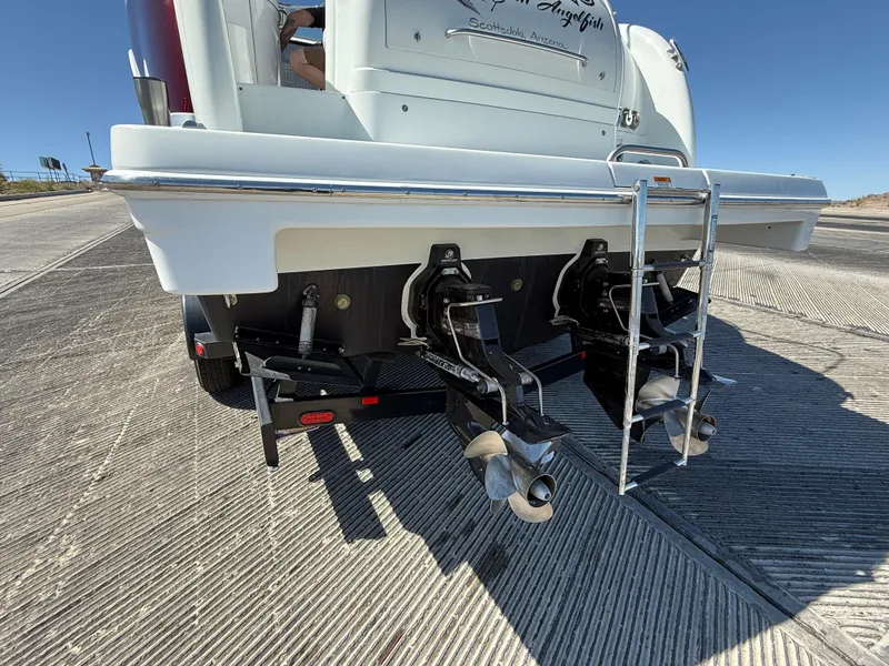 Slide: The Image of Rear view of a 2007 Formula 34 Cruiser boat with dual propellers. - 5