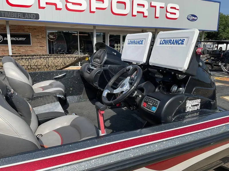 Slide: The Image of 2015 Nitro Z9 DC Z-PRO boat interior with dual Lowrance displays at dealership. - 15