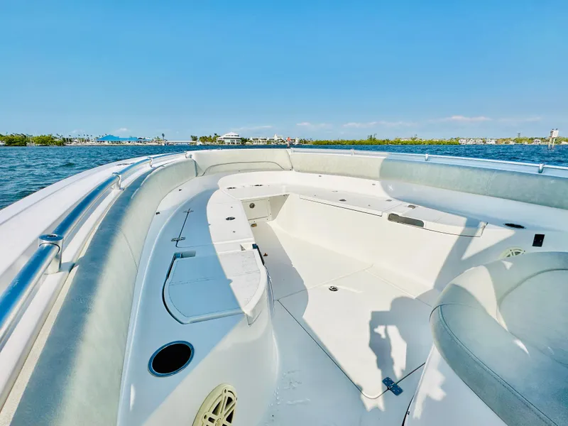 Slide: The Image of 2020 Sportsman Open 282 Center Console boat on calm water, sunny day. - 16