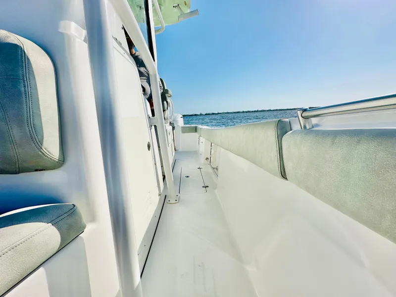 Slide: The Image of 2020 Sportsman Open 282 Center Console boat interior with ocean view. - 19