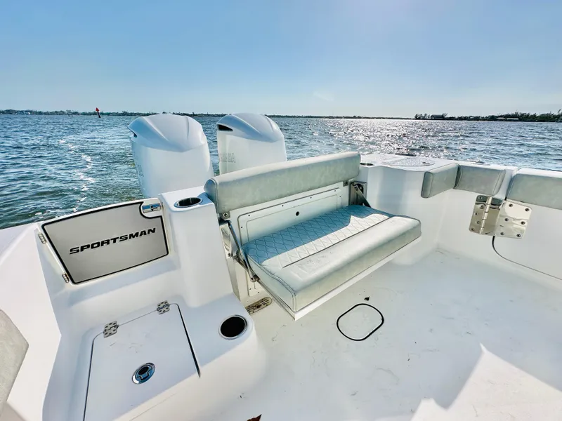 Slide: The Image of 2020 Sportsman Open 282 Center Console boat with seating, on calm water. - 22