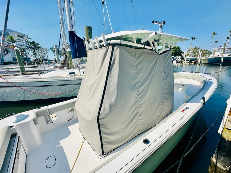 Slide: The Image of 2020 Sportsman Open 282 Center Console boat docked at marina. - 25