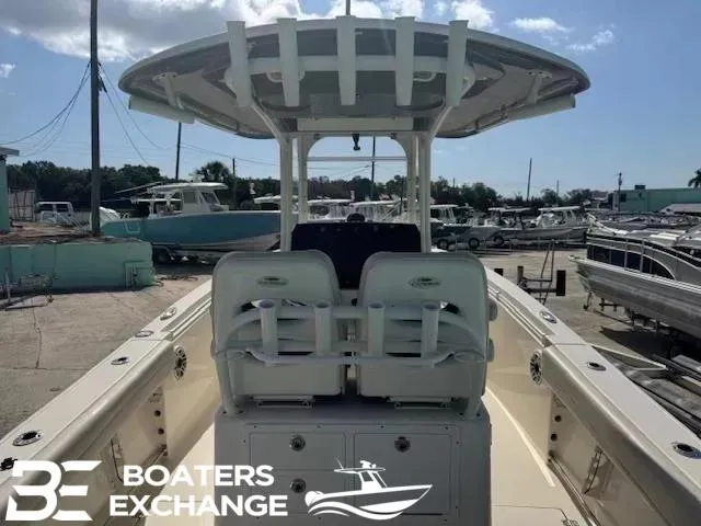 Slide: The Image of 2020 Cobia 262 boat at Boaters Exchange, featuring dual seating and a spacious deck. - 5