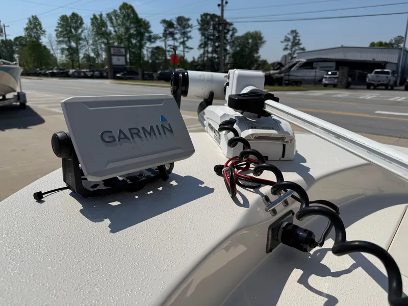 Slide: The Image of 2021 Carolina Skiff 192 JLS boat with Garmin navigation system and electronic equipment. - 12
