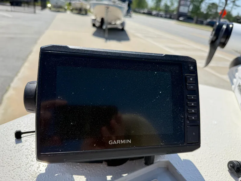 Slide: The Image of Garmin device on 2021 Carolina Skiff 192 JLS boat, outdoor setting. - 13