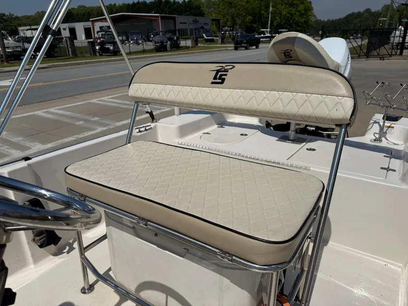 Slide: The Image of 2021 Carolina Skiff 192 JLS boat seat with beige diamond-pattern upholstery. - 17