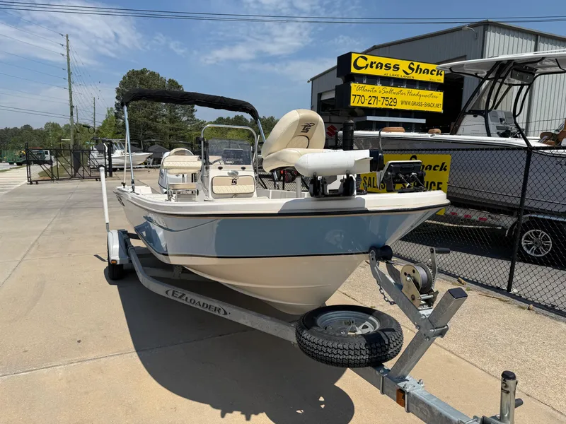 Slide: The Image of 2021 Carolina Skiff 192 JLS boat on trailer, parked outside dealership. - 2